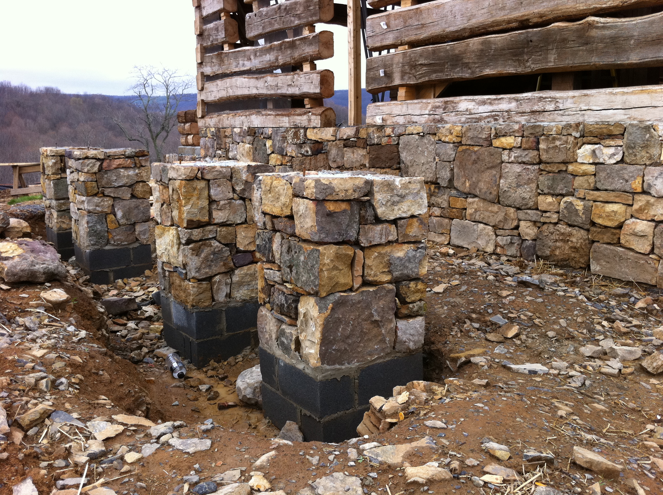 Stone piers in rocky ground - Handmade Houses with Noah Bradley